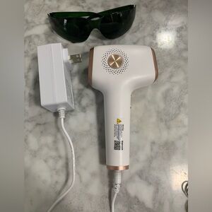 White and Gold Hair Removal Device